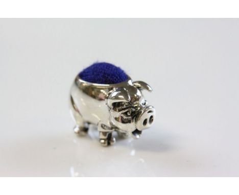 Silver pig pincushion