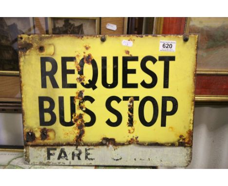 A vintage request bus stop double sided metal sign