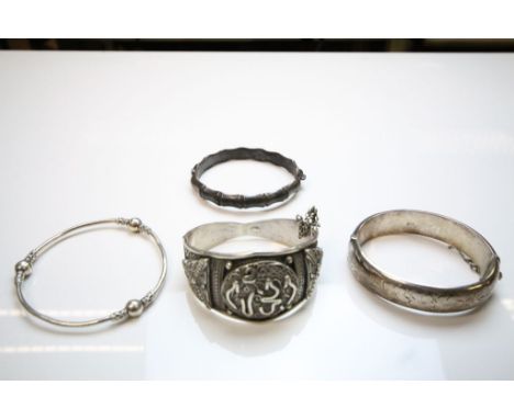 Four Hallmarked Silver/ white metal bangles