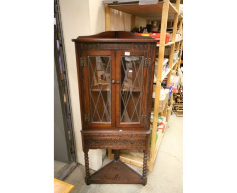 Jacobean Style Oak Corner Cabinet with Two Leaded Glazed Doors over Drawer and Shelf Below