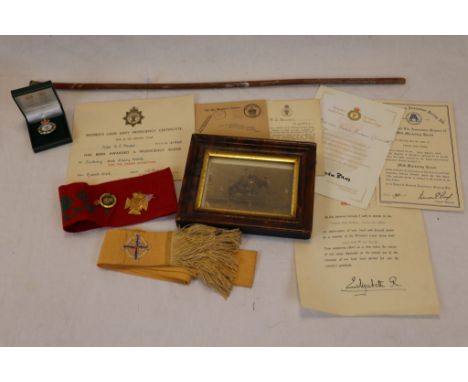 Collection of items relating to the Women's Land Army to include ephemera, arm band and presentation badge. To also include a