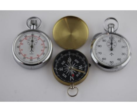 Two British Military Issue Stopwatches both displaying the broad arrow (pheon) dating to 1974 and 1982 plus  one other compas