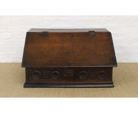 A Large Early 18th Century Oak Bible Box A Large 18th Century Oak Bible Box, inscribed LM 1722 to the cover above carved repe