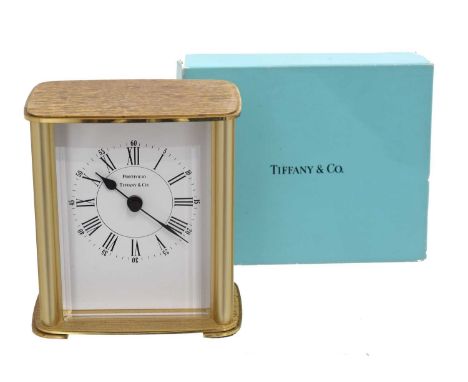 A "Portfolio" Carriage Clock by Tiffany & Co. A "Portfolio" Carriage Clock by Tiffany &amp; Co., in gilt brass, set with Roma