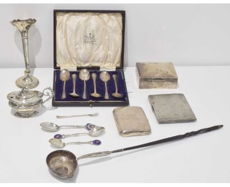 A selection of silver. To include a cased set of teaspoons, souvenir spoons, toddy ladle, vase, etc. gross weight of solid si