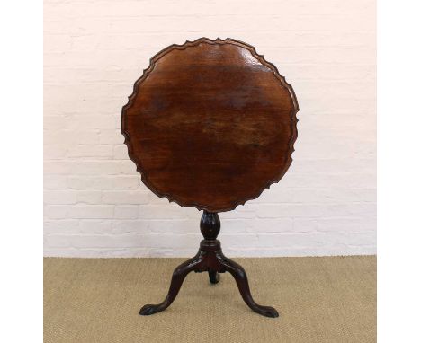 A George III Mahogany Tilt and Swivel-Top Tripod Occasional Table A George III Mahogany Tilt and Swivel-Top Tripod Occasional