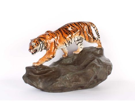 An Early 20th Century "Tiger on Rock" Figure by Royal Doulton An Early 20th Century "Tiger on Rock" Figure by Royal Doulton, 
