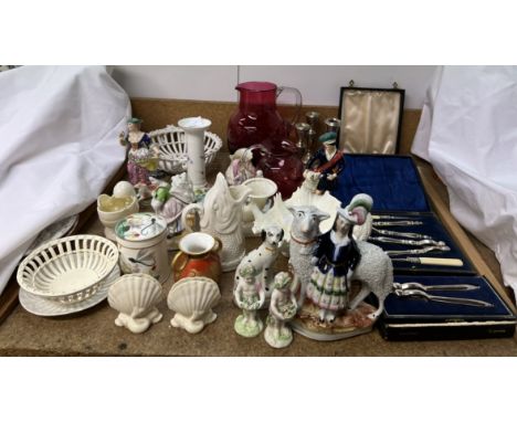 Three silver candlesticks together with cased nut crackers, cranberry glass jugs, Staffordshire figures, Belleek and Royal Wo