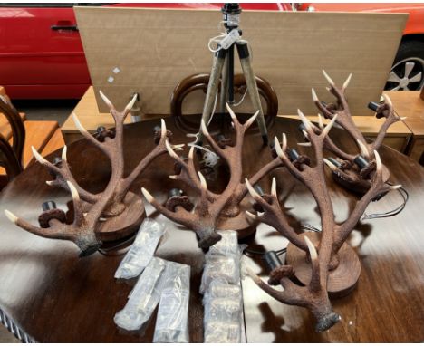 A set of four faux antler wall lights from David Hunt Lighting, together with a tripod lamp base 
