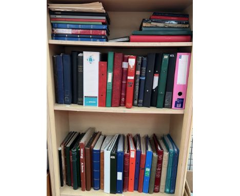 A large collection of stamp albums and stock books including Australia, Canada, Germany, America, British Commonwealth, etc 
