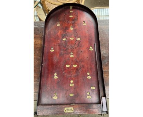 An Amersham "Scora" Bagatelle board with balls