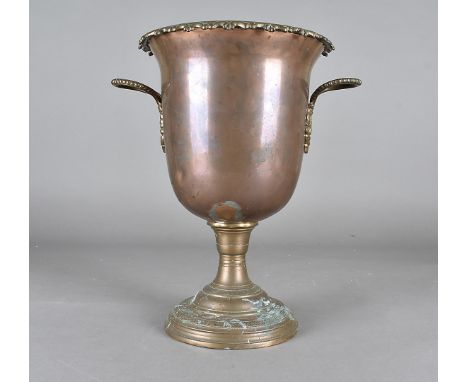 A Victorian copper planter, of urn form, with Pyrke & Sons label to the inside, having decorative rim, twin handles and engra