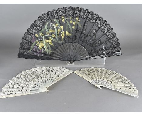 A Victorian mother of pearl, lace and bone hand fan, the lace leaf, 24 cm long cased, together with another example in black,