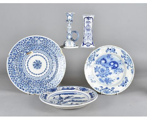 Five 19th century Dutch and English blue and white plates, mostly drilled, together with a Dutch delft charger, a candlestick