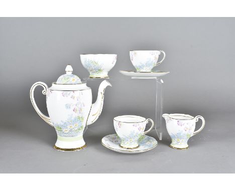 A Royal Standard tea set, having Wild Flower pattern, 9671, comprising teapot and cover, six cups and saucers, sugar bowl and