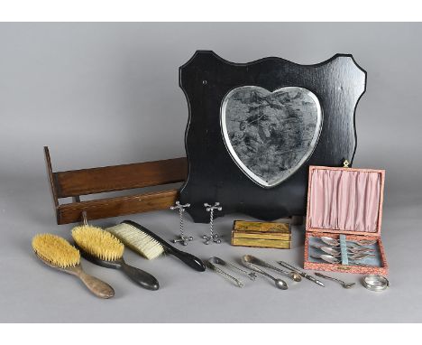 An Edwardian book trough, with satin wood stringing, also an Arts and Crafts heart shaped mirror, a box wood hinged box and v