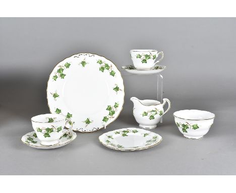A Colcough pattern part tea service, comprising 12 cups and saucers, a milk and cream jug, two sugar bowls, 16 side plates an
