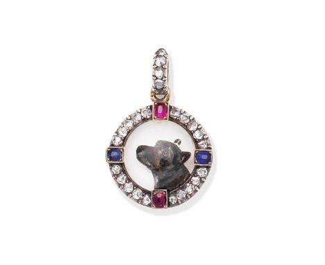 ROCK CRYSTAL INTAGLIO, RUBY, SAPPHIRE AND DIAMOND-SET PENDANT, CIRCA 1900The central plaque reverse carved to depict a dog, w