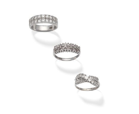 THREE DIAMOND RINGS1st: Half-set with two rows of brilliant-cut diamonds, 2nd: Set with alternating baguette and brilliant-cu