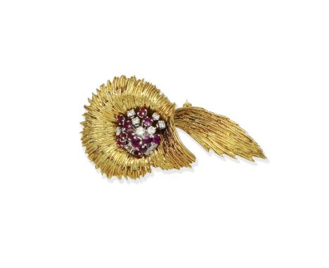 RUBY AND DIAMOND-SET BROOCH, 1969Of textured spray design, centrally-set with a cluster of circular-cut rubies and brilliant-
