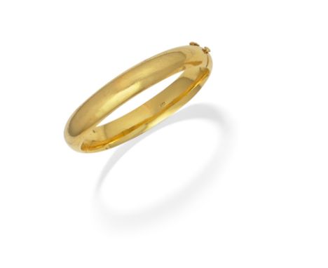 BANGLEThe hinged bangle of polished design,  inner circumference 19.0cm For further information on this lot please visit Bonh