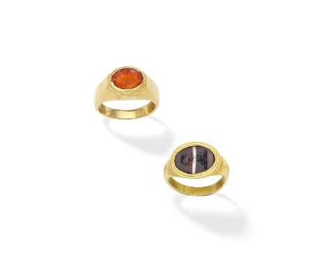 BANDED AGATE INTAGLIO RING AND BULGARI: CARNELIAN INTAGLIO RING1st: The banded agate depicting a swan's head atop a coronet o