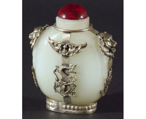 A PAIR OF CHINESE MUTTON FAT JADE AND WHITE METAL MOUNTED SNUFF BOTTLES, of flattened ovoid form, the mounts with dragons, bi