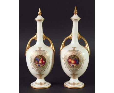 PAIR OF ROYAL WORCESTER VASES AND COVERS, date code for 1922, signed W Bee, shape 2700, painted with roundels of fruit on an 