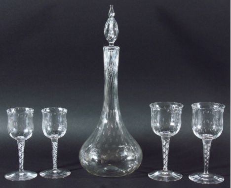 SUITE OF DRINKING GLASSES, 20th century, the bowl with air inclusions above an air twist stem and spreading foot, comprising 