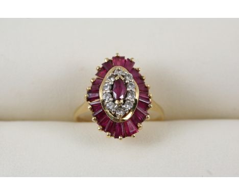 A RUBY AND DIAMOND CLUSTER RING centred with a marquise-shaped ruby within a surround of circular-cut diamonds and tapered ba