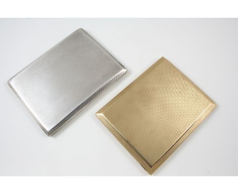A 9CT. GOLD CIGARETTE CASE BY DUNHILL of rectangular-shape, with engine turned decoration to both sides, 8.5 x 11cm., hallmar