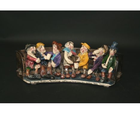 WILL YOUNG POTTERY GROUP - WIDECOMBE FAIR a pottery group depicting figures from Widecombe Fair, seated on a Tavern bench. Ma