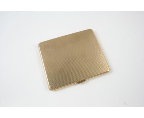 A 9CT. GOLD CIGARETTE CASE of rectangular shape, with engine turned decoration, with inscription to the inside dated 1953, 8.