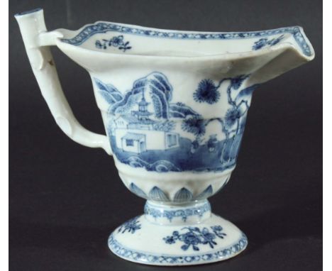 CHINESE EXPORT HELMET SHAPED JUG, possibly late 18th century, blue painted with a lakeside landscape, height 13cm