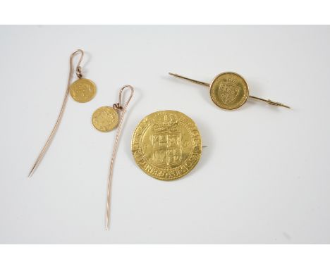 A GOLD SHIELD GUINEA 1788, mounted in a gold brooch fitting, together with a gold unite of James I, mounted with a brooch fit