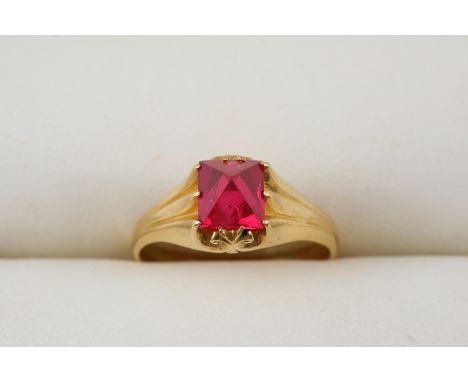 A SPINEL SINGLE STONE RING set with a pink spinel, in gold. Size R.