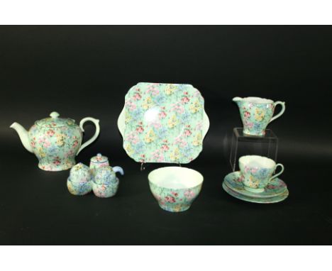 SHELLEY TEA SERVICE - MELODY a Shelley tea service in the Melody pattern. Comprising a Teapot, Sugar bowl and Milk Jug, Side 