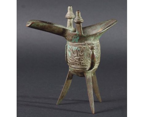 CHINESE BRONZE JU, of archaestic tripod form, 16.5cm