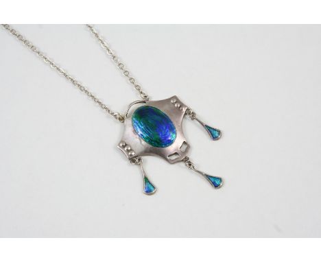 AN ART NOUVEAU ENAMEL AND SILVER PENDANT BY CHARLES HORNER the silver pendant with blue and green enamel decoration, signed C