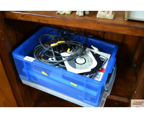 A box containing pictures prints, photograph accessories