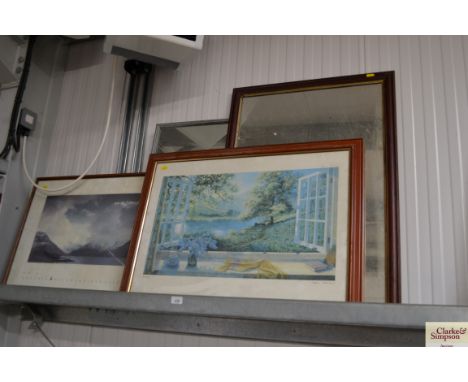 Two wall mirrors together with two prints