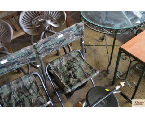 A small folding hunting stool (4)