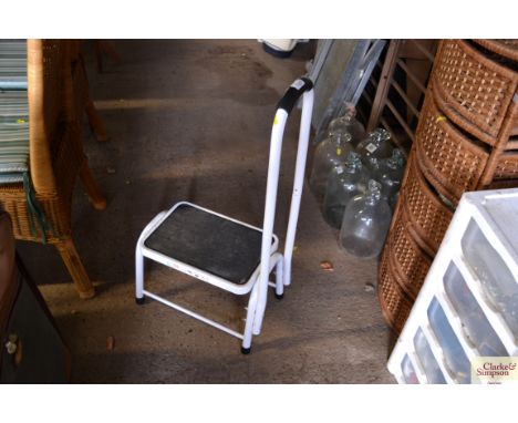 A small white caravan step