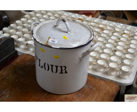 An enamel flour bin