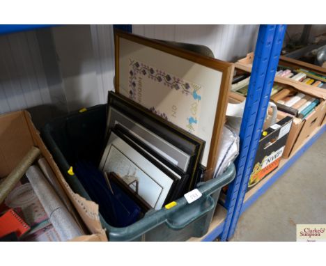 A box of various pictures and prints