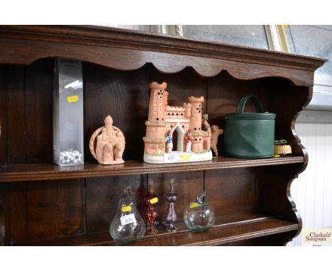 A quantity of decorative china etc. to include a Staffordshire style flat back, a facial roller, small green bag etc.
