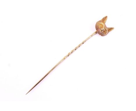 An early 20th century gold fox mask stick pin. Realistically chased with an alert expression, the fox's head 13mm high, 4.4g 