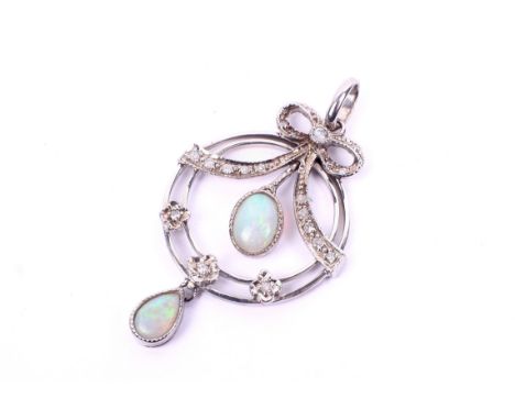A 9ct white gold opal and diamond pendant. The central opal suspended from a ribbon studded with chip diamonds and encircled 