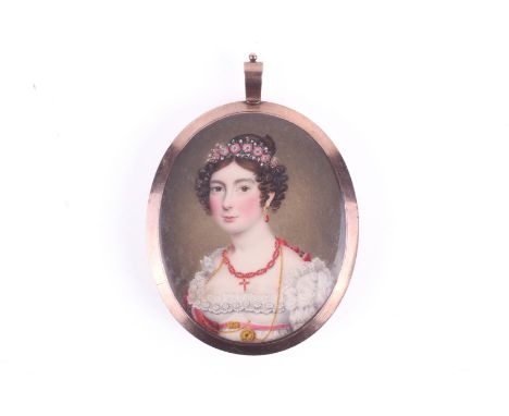 An early 19th century oval miniature painting on ivory of a young lady. Crowned with a garland of flowers and with a red cora