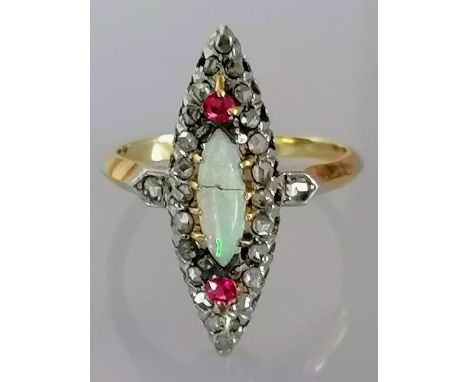 An French Belle Epoque opal, ruby and diamond ring in a white and yellow metal basket setting, size O, the marquise-cut opal 